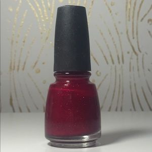 Sparkly red nail polish